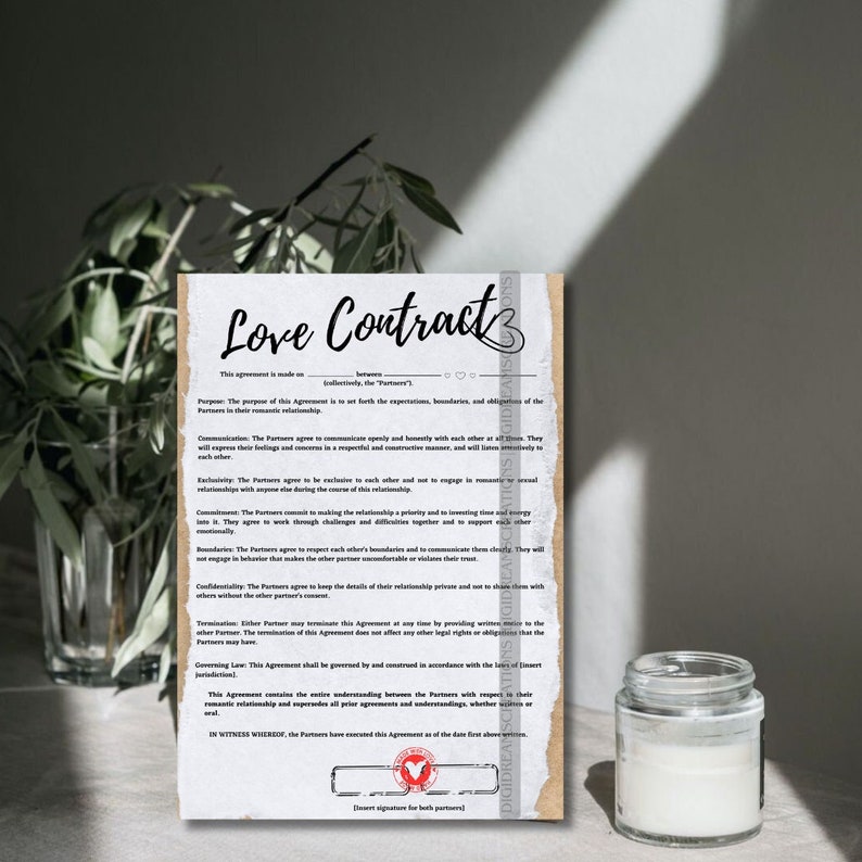 couple reviewing printed wedding contract at table