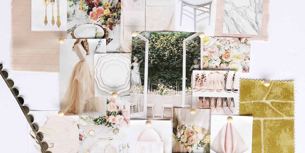 wedding planner with fabric swatches and floral mood board on desk