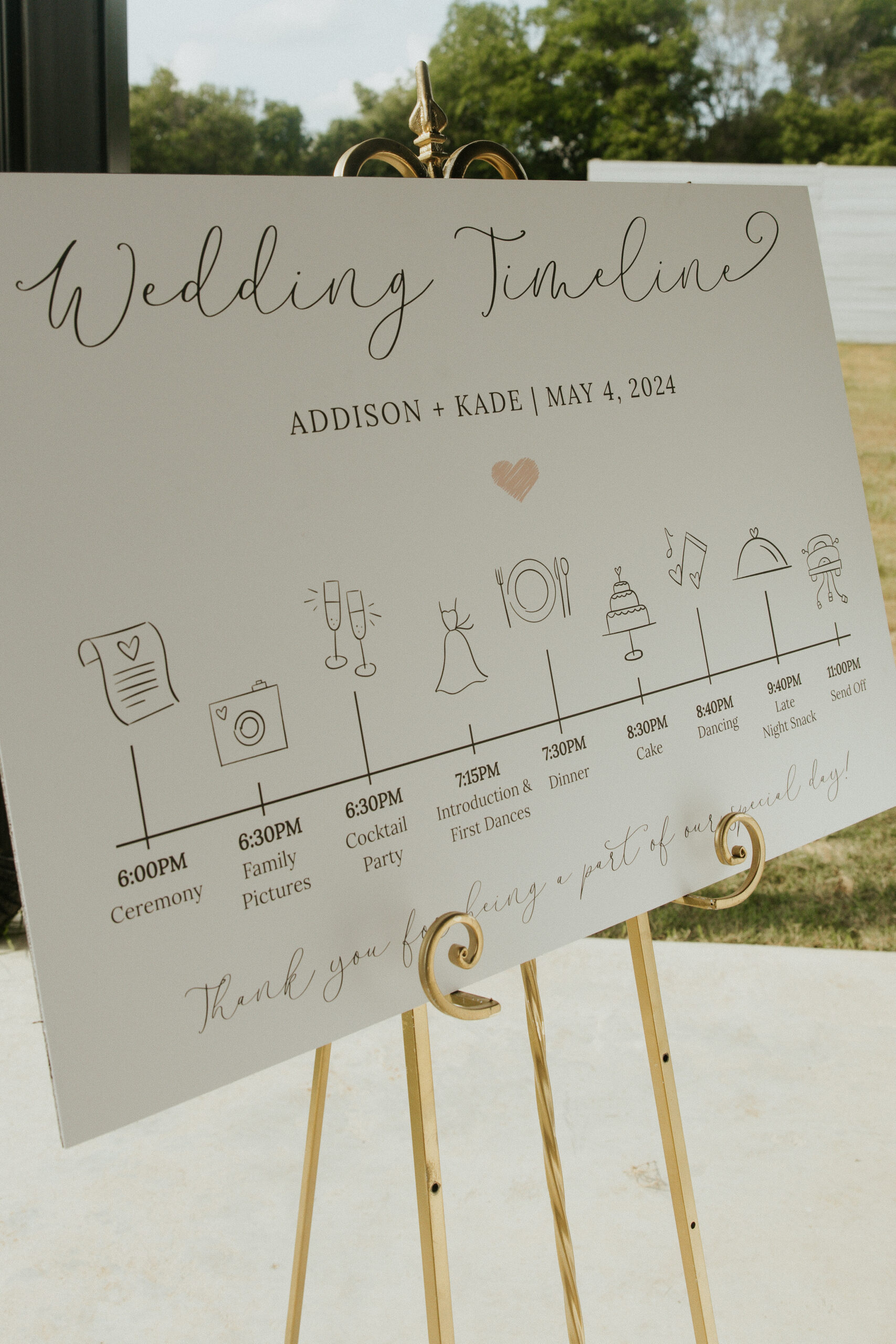 wedding day timeline printed on clipboard at venue